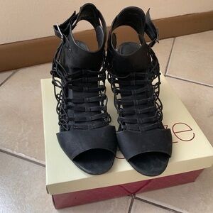 Black shoes with a lot strings